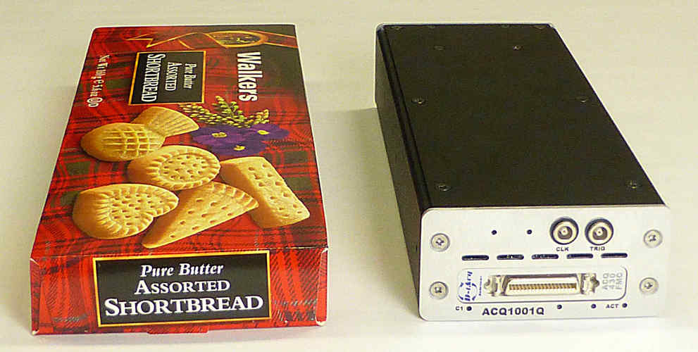 ACQ1001 carrier + ACQ430FMC in 1U "shortbread" box, with a well-known brand of biscuit for scale.